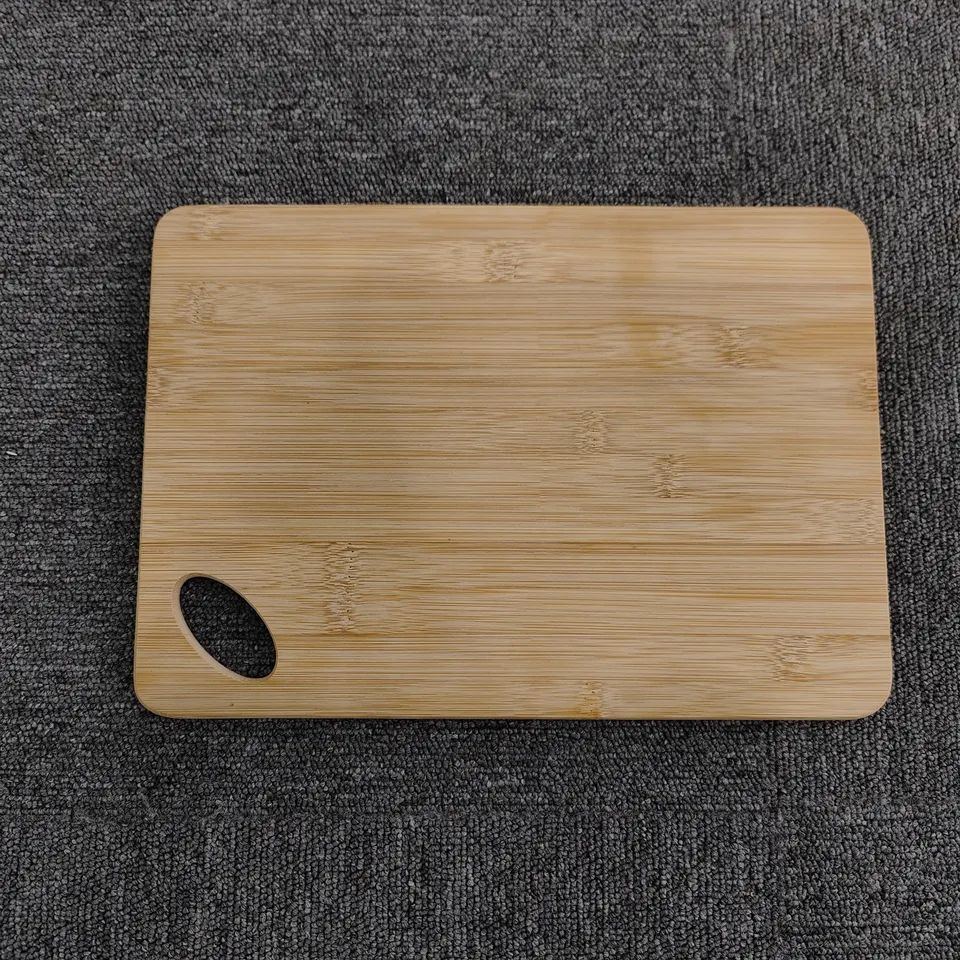 Bamboo chopping board with oval hole