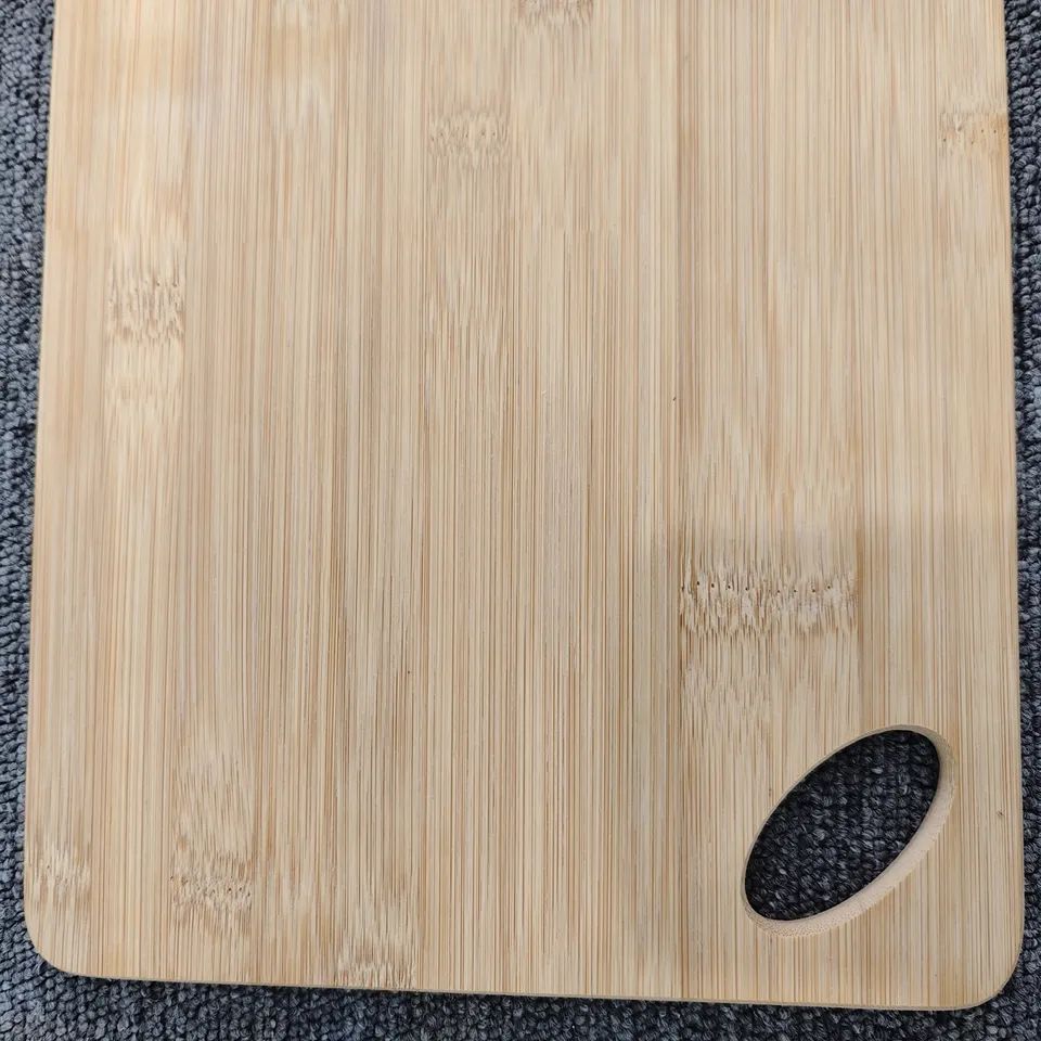 Bamboo chopping board with oval hole