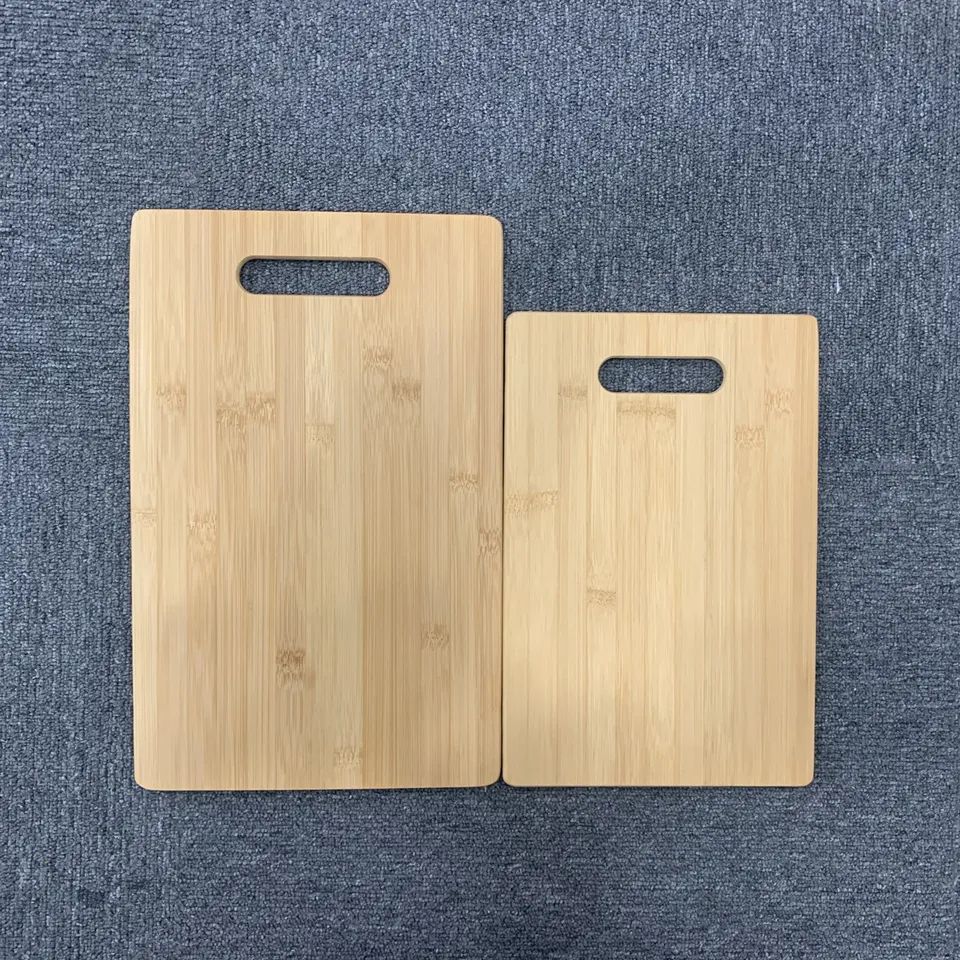 Set of two bamboo chopping boards with holes