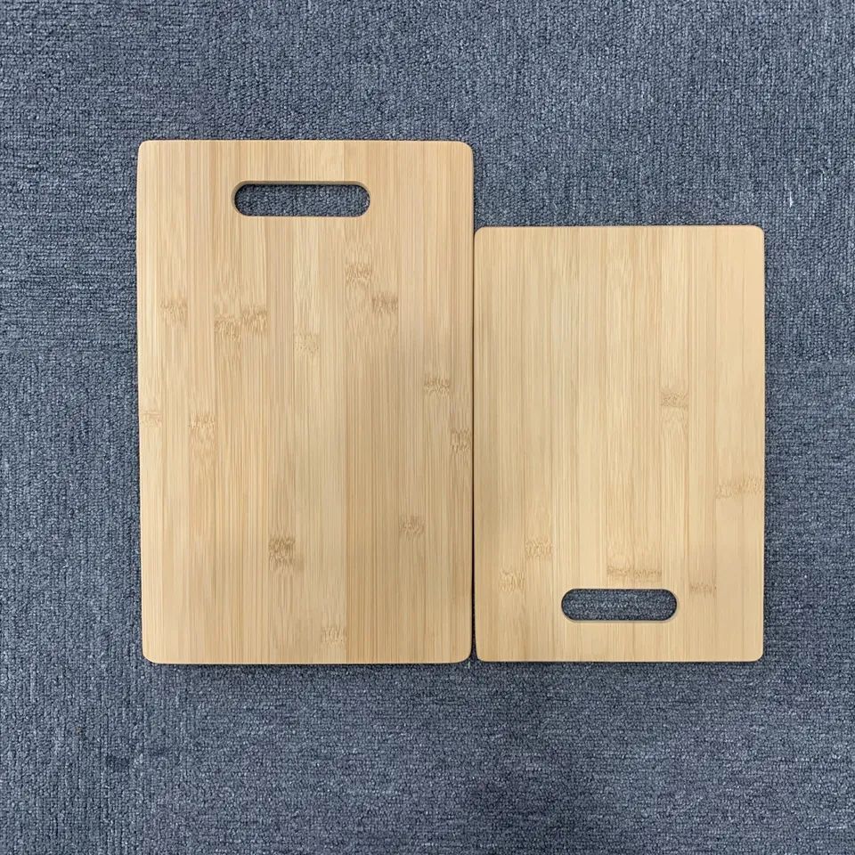 Set of two bamboo chopping boards with holes