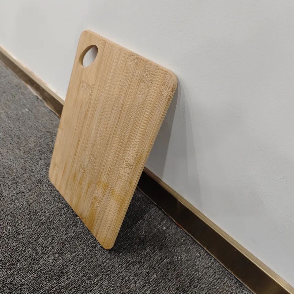 Bamboo chopping board with oval hole